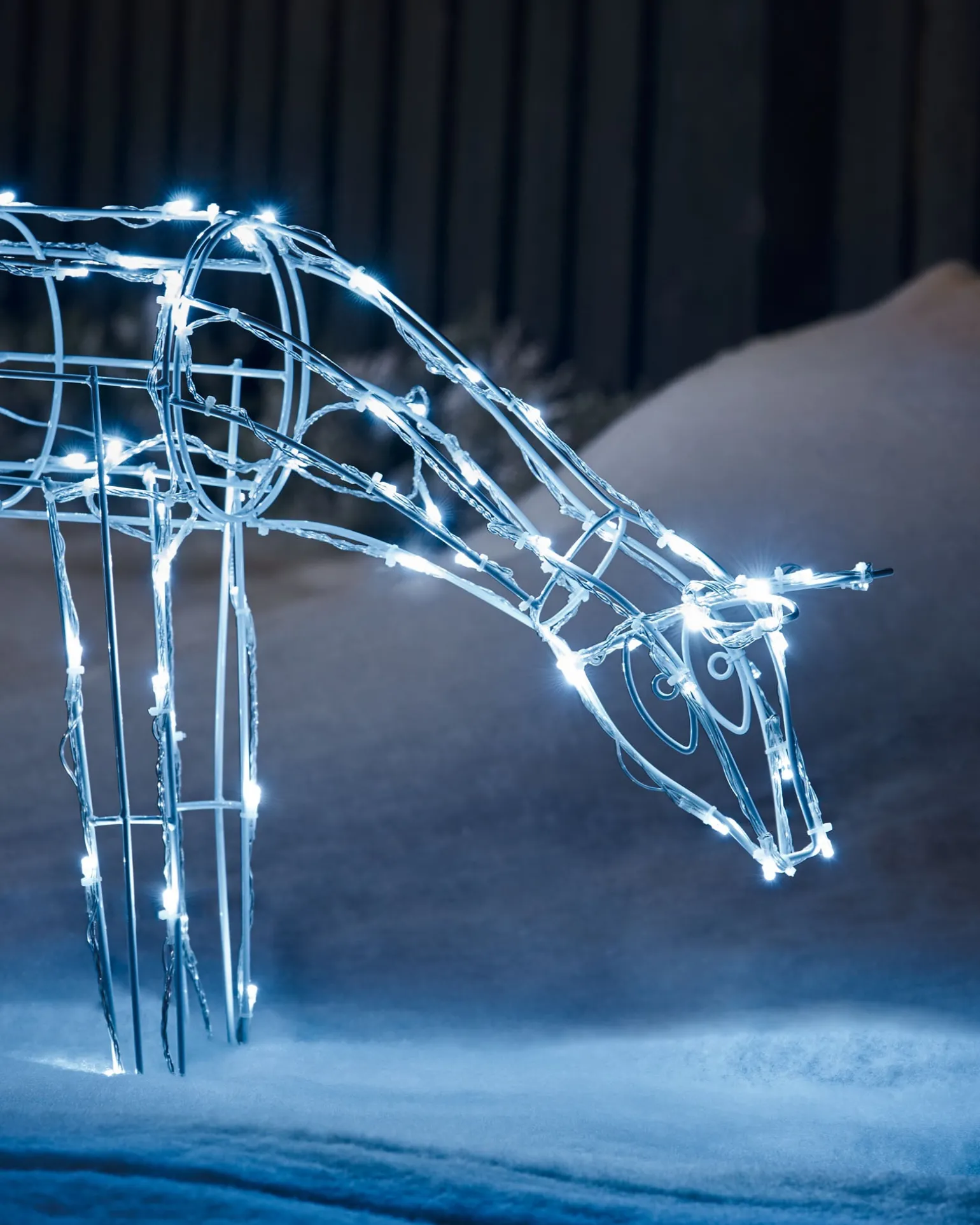 WeRChristmas 3D Twinkling Grazing Reindeer Silhouette, White, 68 Cm^ Outdoor Lighted Reindeer