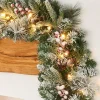 WeRChristmas Pre-Lit Extra Thick Mixed Pine Snow Flocked Garland, Pinecones & Berries, Static, 9 Ft^ Snow Flocked Garlands|Decorated Garlands