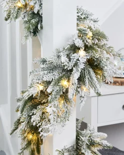 WeRChristmas Pre-Lit Snow Flocked Natural Fir Garland, 18 Ft^ Extra Large Garlands|Snow Flocked Garlands