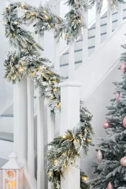 WeRChristmas Pre-Lit Snow Flocked Natural Fir Garland, 18 Ft^ Extra Large Garlands|Snow Flocked Garlands