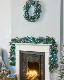 WeRChristmas Pre-Lit Snow Flocked Wreath, Pinecones, 60 Cm^ Decorated Wreaths